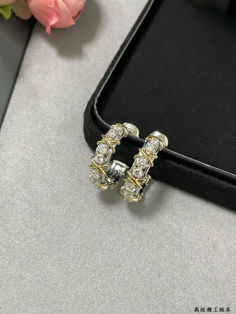 T*f*ny earrings